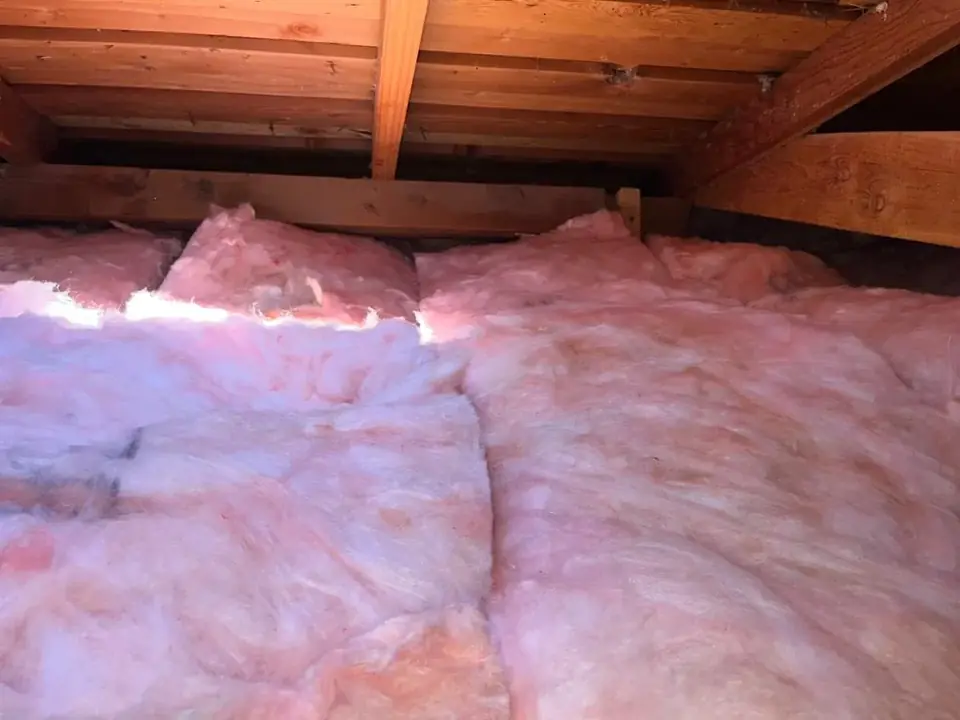 New pink batt insulation fitted between attic joists