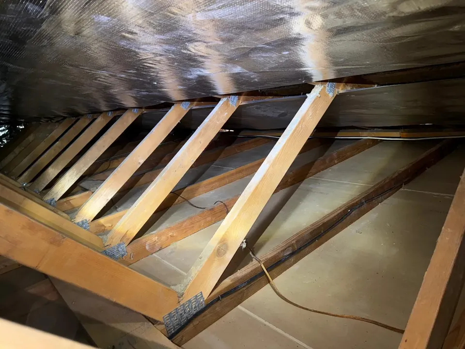 Radiant barrier foil installed under the roof rafters