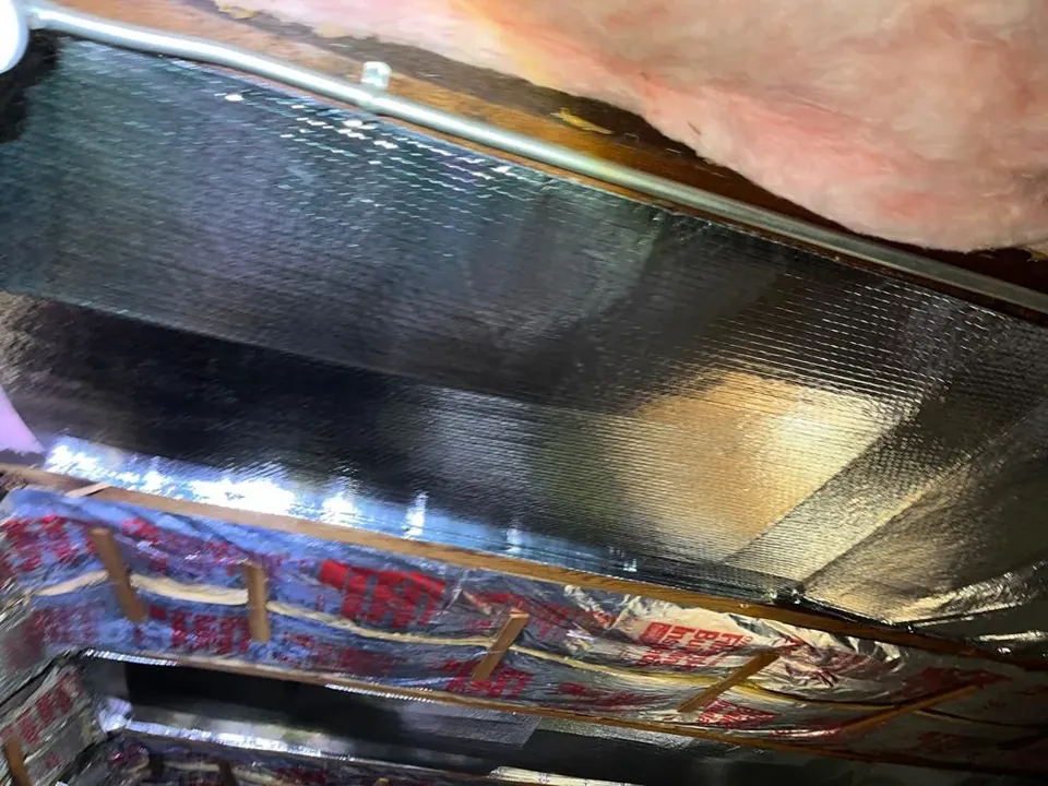 Radiant barrier foil installed under the roof deck